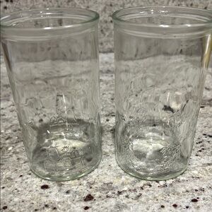 2 vintage Peanuts Smucker’s jam jar glasses
